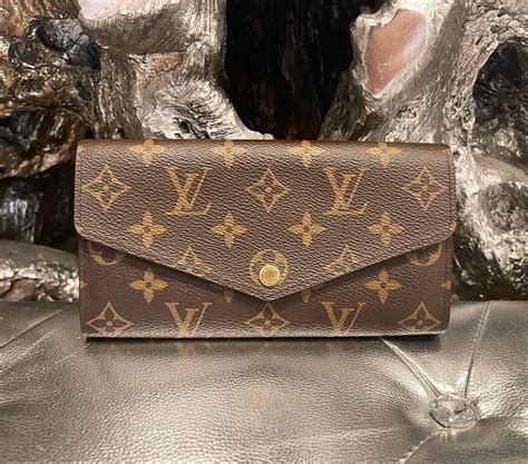 louis vuitton sarah wallet dimensions|Louis Vuitton embossed wallet.